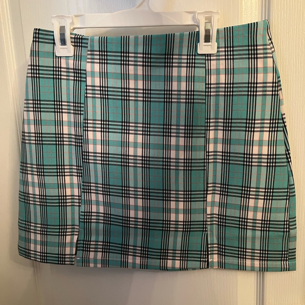 mint skirt with slits at the bottom.